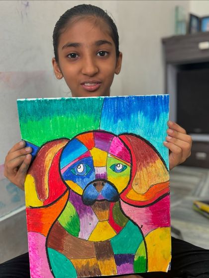 A 6th-grade student holds her colourful dog portrait done in the style of Cubism. In my classes, we explore different art movements to broaden our creative horizons.