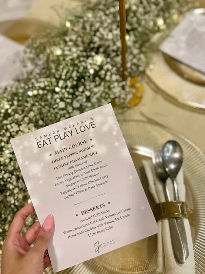 The menu for a special "Eat Play Love" themed games night, detailing the multi-course meal designed to complement an evening of fun and connection.