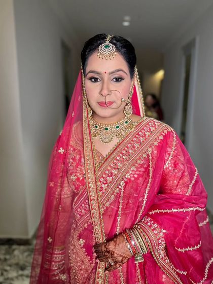 A touch of magic and a dash of grace. This surreal look is perfect for a bride or a guest who wants to look like a vision of love.