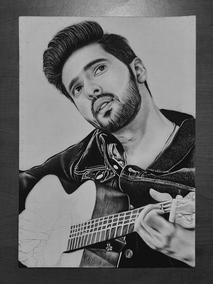 Follow the 90-hour journey of my Armaan Malik portrait. These progress shots show how I use the grid method to ensure accuracy and build up the face, hair, and clothing textures.