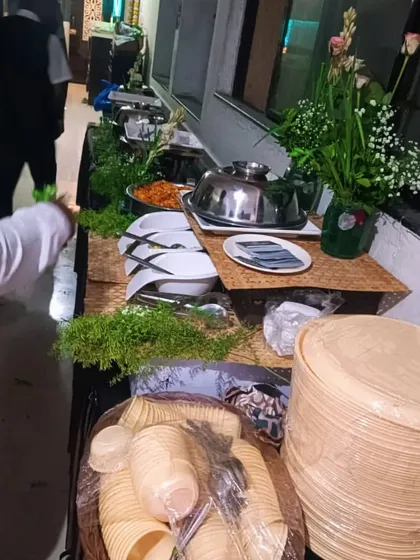 Another angle of the house warming buffet, showing the arrangement of plates and cutlery. We take care of all the small details.