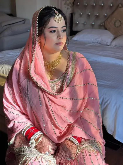 Another sun-kissed shot of my Anand Karaj bride. The makeup is minimal and elegant, designed to look flawless in natural light.