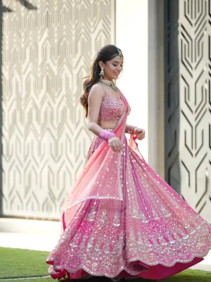Feel the joy of celebration in this stunning, twirl-worthy pink lehenga. Perfect for a sangeet, engagement, or even a modern bridal look, my rental collection offers vibrant, designer outfits that make a statement and create unforgettable photos.