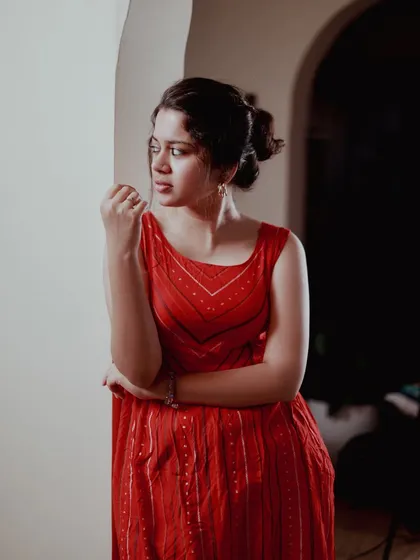 A more pensive, thoughtful portrait. By changing the lighting and pose, we can create a completely different mood, showing off the model's range.