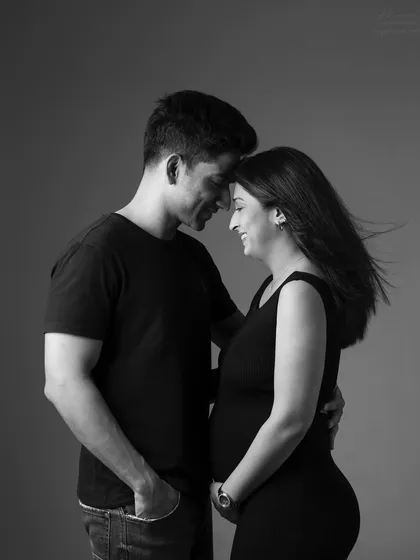 The connection between two people about to become parents is pure magic. This intimate black and white couple portrait captures that gentle, unspoken love.