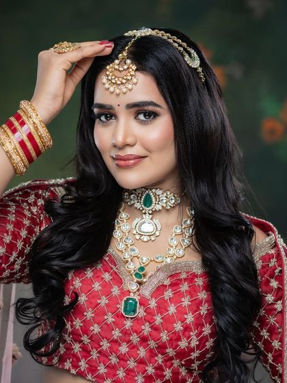 A happy and radiant bride, ready for her big day.