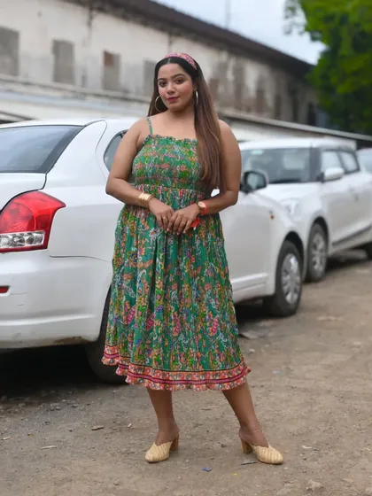 Another shot of my Day 1 look, a comfortable yet festive green floral dress perfect for a summer concert.