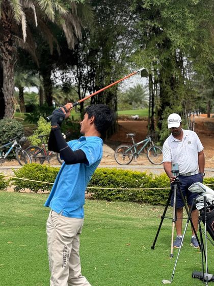 Our coaches are constantly on the range, providing hands-on instruction. From demonstrating a swing path to analyzing a student's setup, these moments of direct mentorship are where real progress is made.