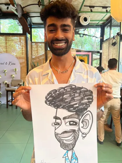 This guest's fun hairstyle was a great feature to draw.