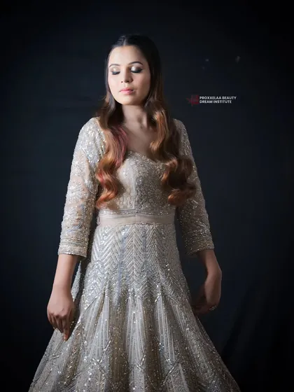 Sometimes all it takes is a little makeup magic to feel unstoppable. This elegant look in a shimmering gown is perfect for a formal event, with soft, glamorous makeup to match.
