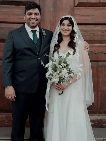 A collection of memories from a beautiful Catholic wedding in Goa. The bride's hair is styled in soft waves under her veil, and her makeup is natural and glowing, capturing her joyful and candid moments perfectly.