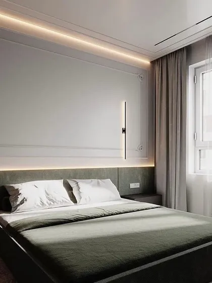In this minimalist bedroom, our vertical wall sconces are mounted on either side of the bed. Their sleek, linear form provides soft, ambient reading light while complementing the room's clean lines and serene atmosphere.