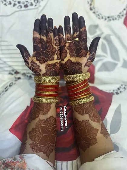 The full view of the stained hands, ready for a celebration.