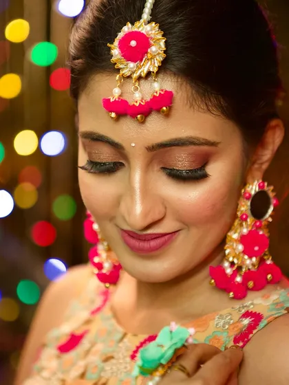 A close-up of the mehendi makeup look. I used warm, shimmery tones on the eyes and a soft matte lipstick to create a look that is both festive and elegant.