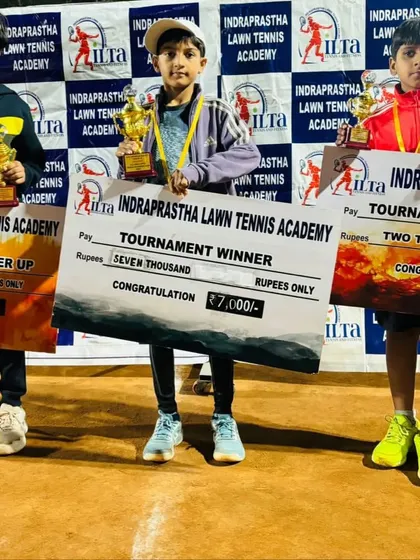 The top three finishers in our prize money tournament, holding their cheques and trophies. I believe in rewarding hard work and success.
