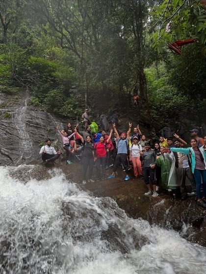 Our group celebrating together at a stream crossing on the Kodachadri trail.