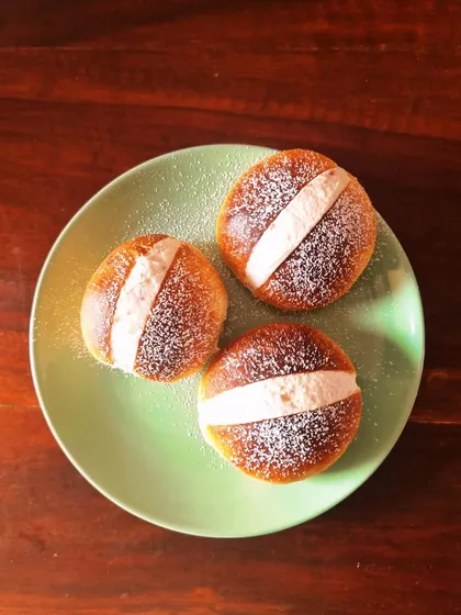 This is my take on a classic Italian sweet bun, the Maritozzo. I make these with a light, airy dough and fill them generously with a luscious strawberry-infused whipped cream. It's a simple, elegant, and truly decadent treat.