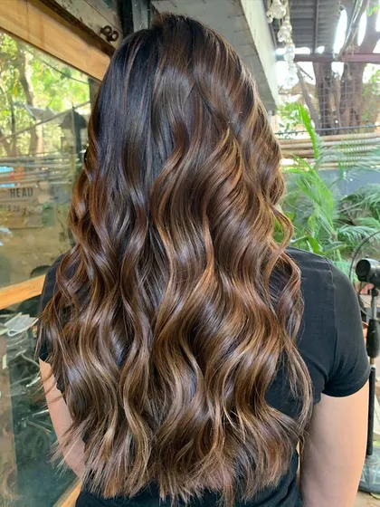 The back view of this gorgeous, long, sun-kissed hair. The non-bleach color is natural and grows out beautifully.
