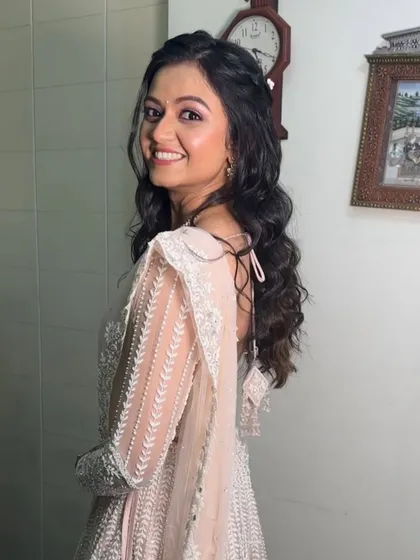 A happy and radiant bride-to-be. The soft glam look enhances her natural beauty without being overpowering.