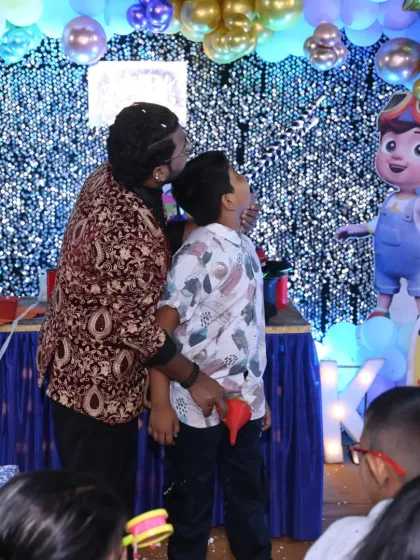 The classic paper-pulling gag is always a highlight. This young man was a great sport and his reaction had the entire audience at this birthday party in stitches.