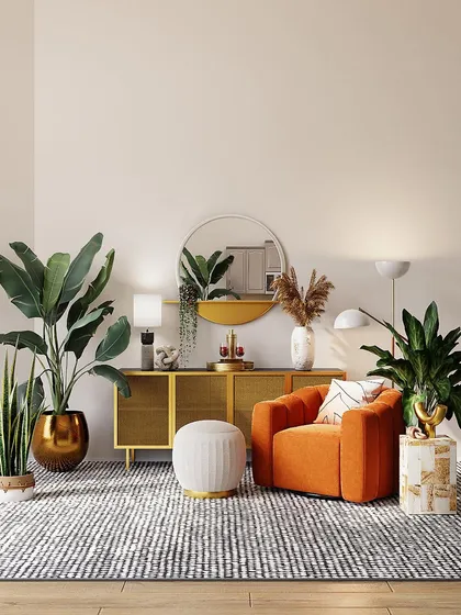 Our indoor plant styling service brings life into your home. Here, we selected a variety of hardy indoor plants like the snake plant and bird of paradise, placing them in statement pots to complement the modern, warm interior design.