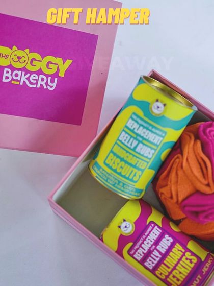 Another look at my gift hamper, combining tasty treats with an engaging snuffle mat toy. It's a gift of both flavor and fun.