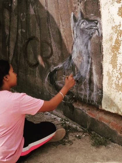 Here are some moments from the creation of the 'Stories of Water' mural. It started with awkward introductions and ended with a community of strangers and friends painting together, sharing stories, and bringing color and conversation to a public space.