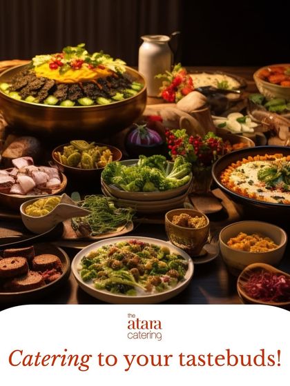 Catering to your tastebuds with a diverse and authentic culinary feast. This image of a lavish spread demonstrates the breadth and quality of our menu.