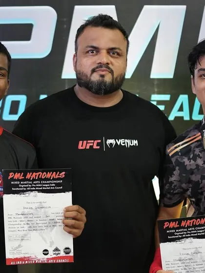 Me with two of our national champions, Daksh and Ayush. It is my honor to guide these young men on their path to greatness.