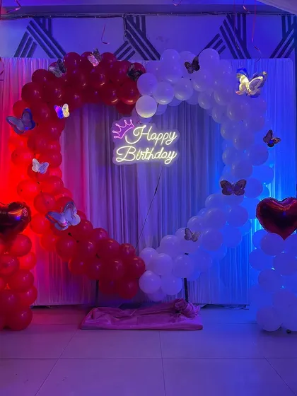 A final look at the beautiful heart-shaped balloon backdrop for a birthday.