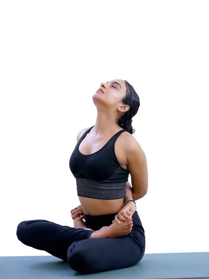 Finding stillness and strength in Baddha Padmasana (Bound Lotus Pose). This posture requires deep focus and opens the chest, symbolizing an offering of the heart.