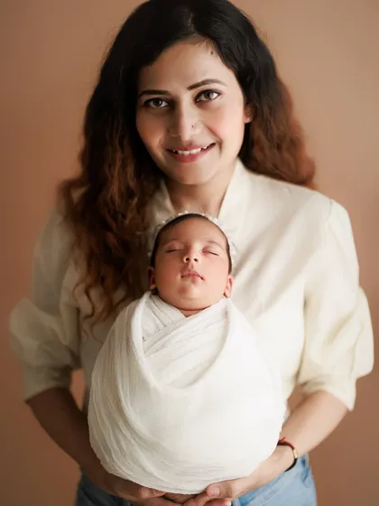 I love capturing classic mother and baby portraits. The simple background keeps all the focus on the beautiful bond between this mom and her sleeping child.