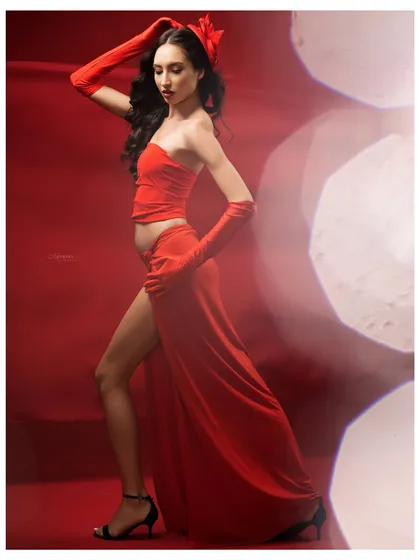 A portrait that captures pure confidence and glamour. Dressed in bold red, this session was about bringing her inner fire to the forefront.