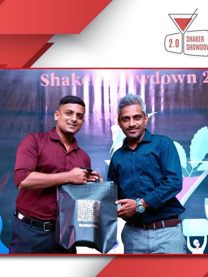 A participant receiving a gift bag. We are grateful for the support of our partners.