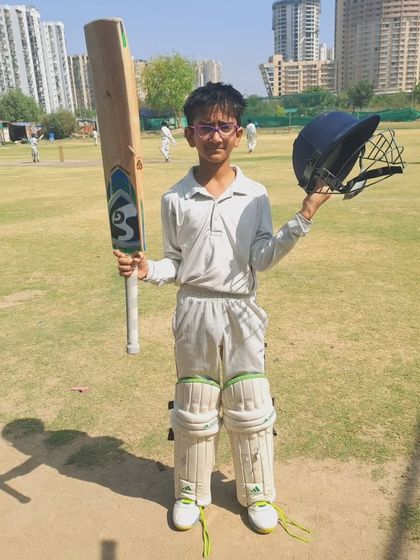 A young batsman from the SKCA Tigers group, proud after scoring a fifty. From hopefuls to match-winners, this is the journey at our academy.