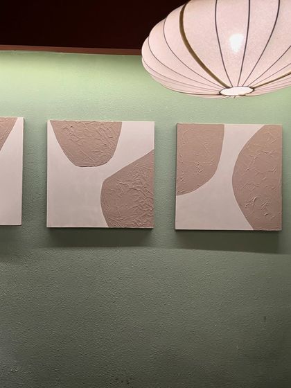 The trio of small textured canvases seen from a distance. They work perfectly as a small gallery wall or can be scattered throughout a space.