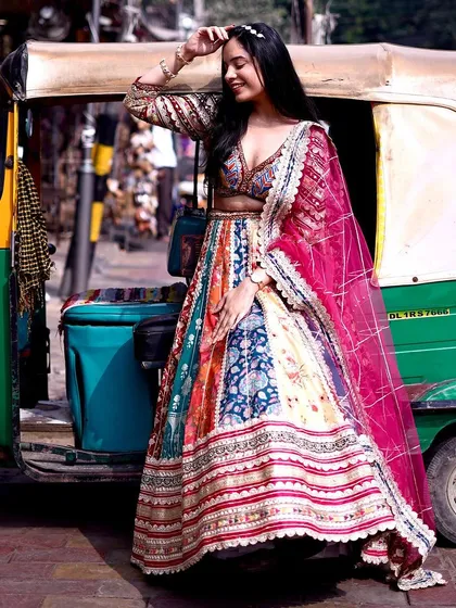 This multicolored lehenga is a party in itself. With a fun mix of colors and patterns, it’s perfect for the girl who loves to make a bold statement.