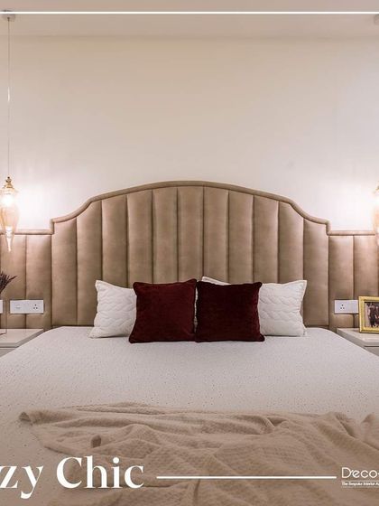 Experience the perfect blend of comfort and style with this cozy chic bedroom. The plush channel-tufted headboard, warm lighting, and rich textures create a welcoming and fashionable retreat.