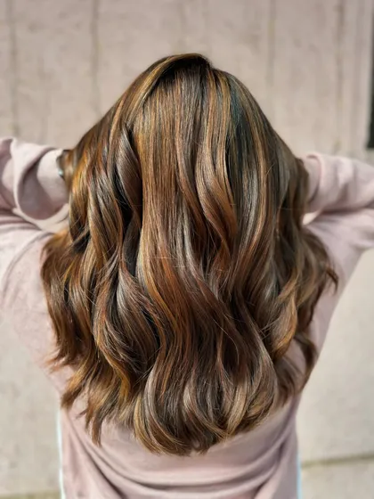 The full effect of this bridal brunette balayage. The color is rich and dimensional, and the hair looks incredibly healthy and glossy.