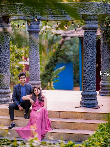 A relaxed and stylish pose for a couple on the steps of our stone gazebo.