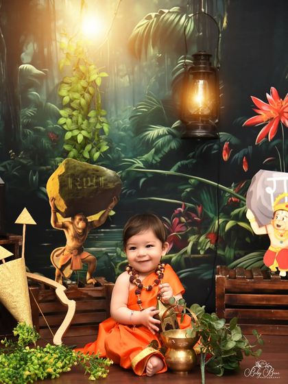 A powerful and unique "Ram Ji" themed shoot. This setup includes elements from the Ramayana, like Hanuman and his mace, creating a visually rich story.
