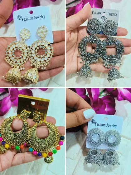 We stock a variety of jhumka-style earring bezels, perfect for creating traditional Indian jewelry. This image displays several designs in both gold and antique finishes, ready for your creative touch.