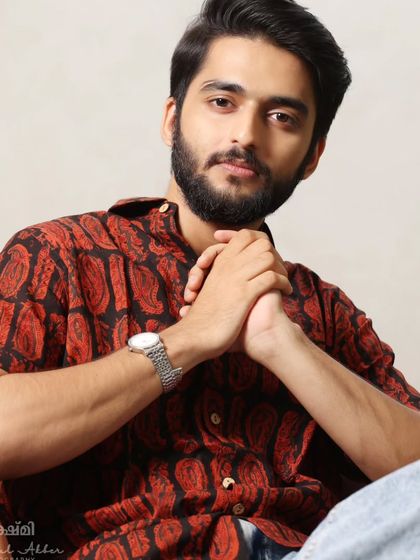 A close-up from Gokul's photoshoot, showing the detailed yet natural makeup and beard styling.