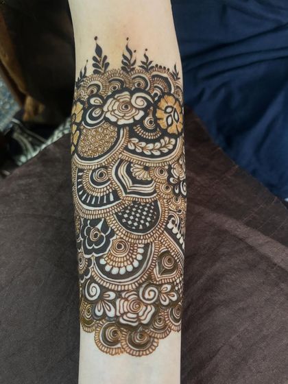 The completed armband, showing the full, intricate pattern.