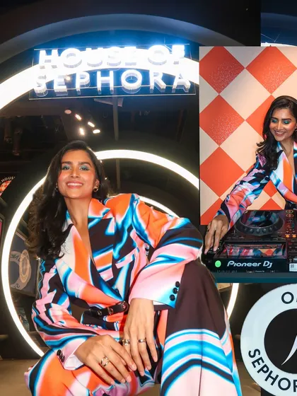A stylish shot of me at the DJ booth during the House of Sephora event. I always match my look to the event's theme.