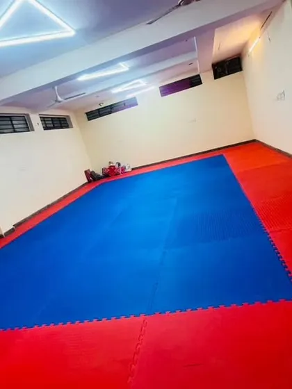 This is our dojo. I provide a clean, spacious, and professionally matted training floor so you can focus completely on your technique and conditioning without any distractions.
