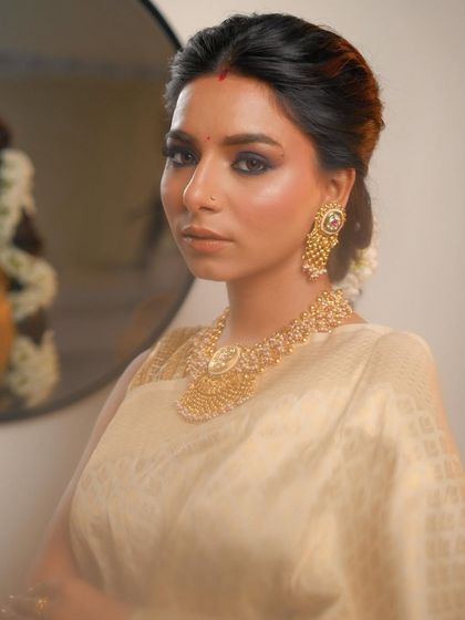 A clearer portrait from the same editorial series, showing the contrast between the dark, smokey eye and the traditional styling.