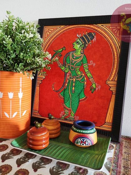 Here is the framed Meenakshi painting, styled for home decor. It shows how a traditional piece of art can become a beautiful focal point, adding color, culture, and a story to your personal space.