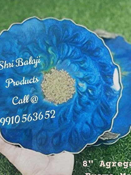 A stunning example of resin art coasters made with our supplies. The vibrant blue and gold create a beautiful geode effect.