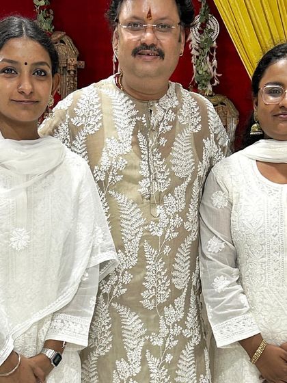 A proud Guru with his students. Posing with the Nair sisters after their wonderful performance at the Swarveni Utsav.